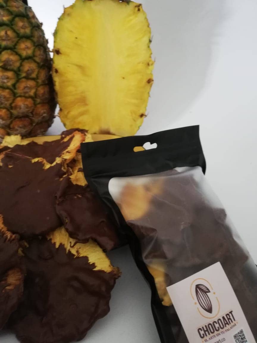 Piña deshidratada cubierta de chocolate x 50 Gr